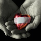 hands-with-heart-and-bandaid